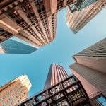 wormseye view of high-rise buildings under blue sky